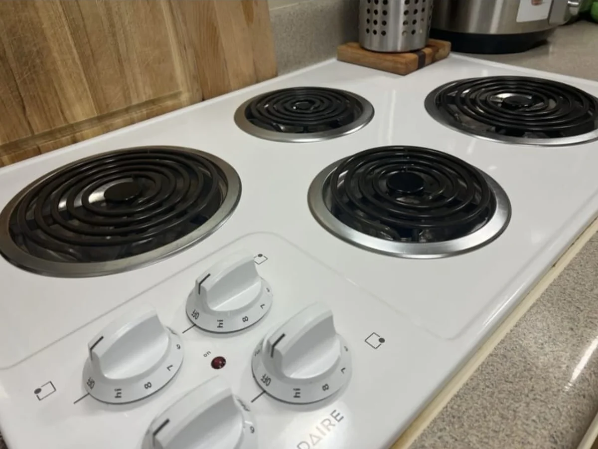 Cooktop scrubbed clean burner by burner