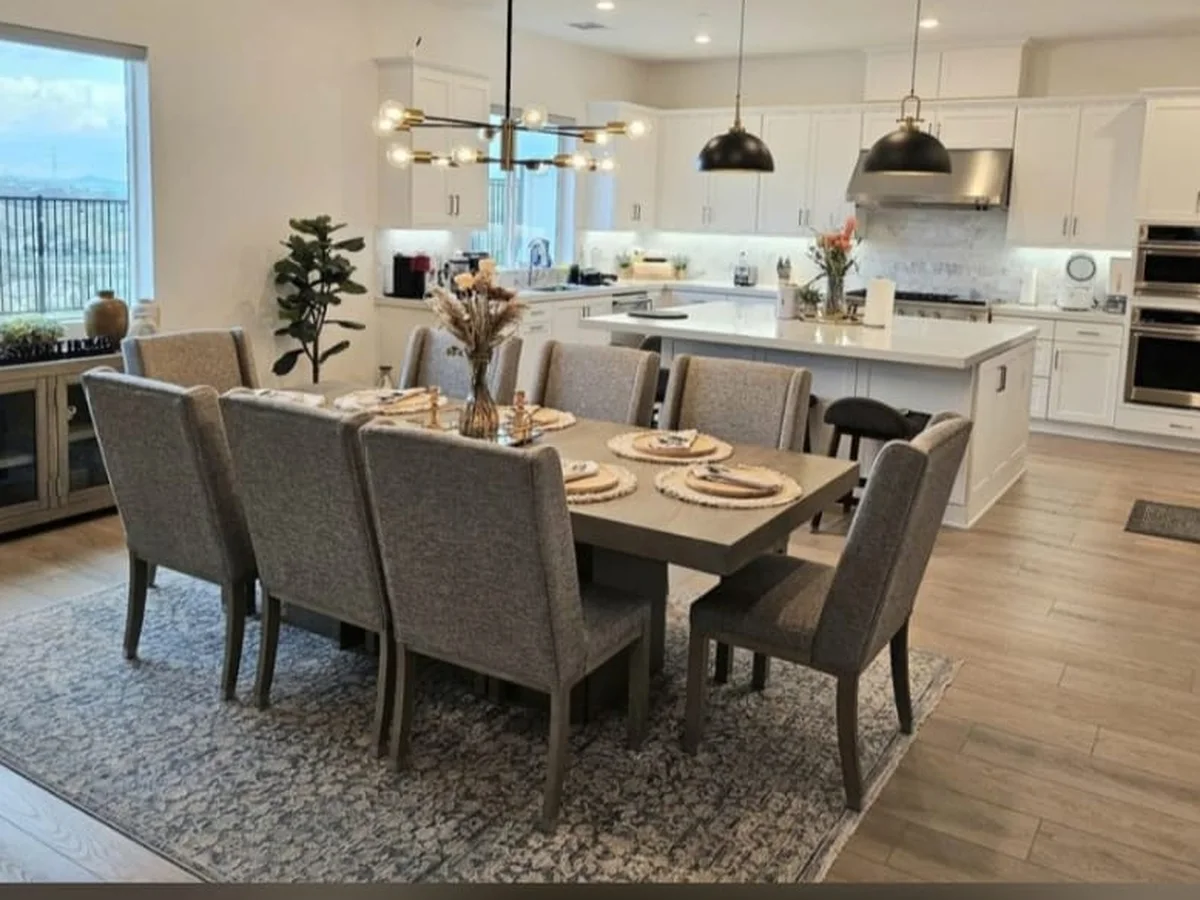 Staged dining room and kitchen left spotless
